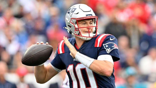 Mac Jones looking to make a pass with the Patriots.